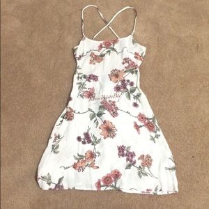 A white Brandy Melville One Size dress.